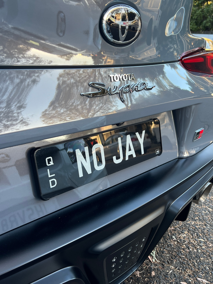 Metal Plate Bracket holding Personalised Plate on Blue Card